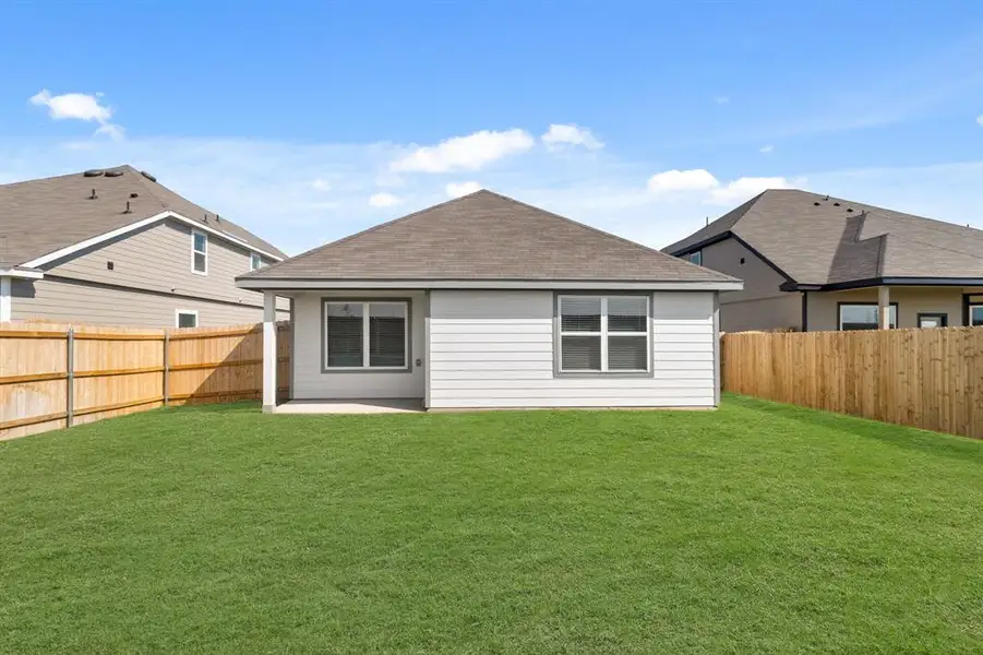 Exterior details and patio area of a home in Retreat at Fossil Creek, Fort Worth (Image 2). Exterior details and patio area of a home in Retreat at Fossil Creek, Fort Worth (Image 2).