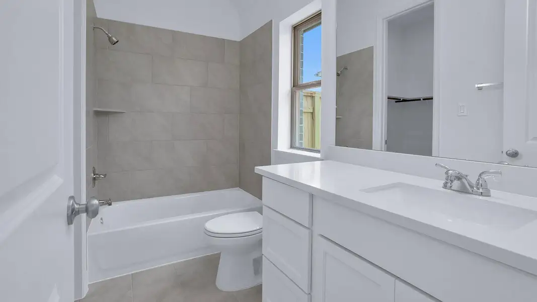 Furnished interior view inside a new home in Grand Central Park 50', Conroe (Image 3). Furnished interior view inside a new home in Grand Central Park 50', Conroe (Image 3).