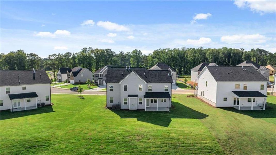 Exterior details and patio area of a home in Independence, Loganville (Image 11).