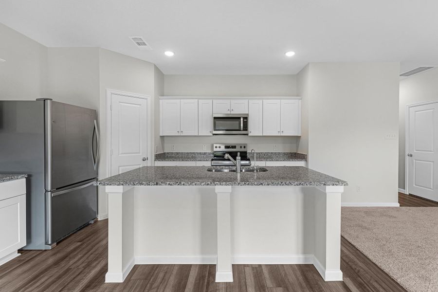 Furnished interior view inside a new home in Stonebrooke, Conroe (Image 2).