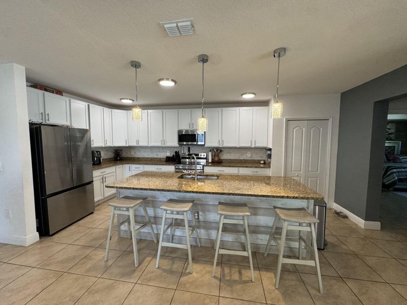 Furnished interior view inside a new home in , Port St. Lucie (Image 6).