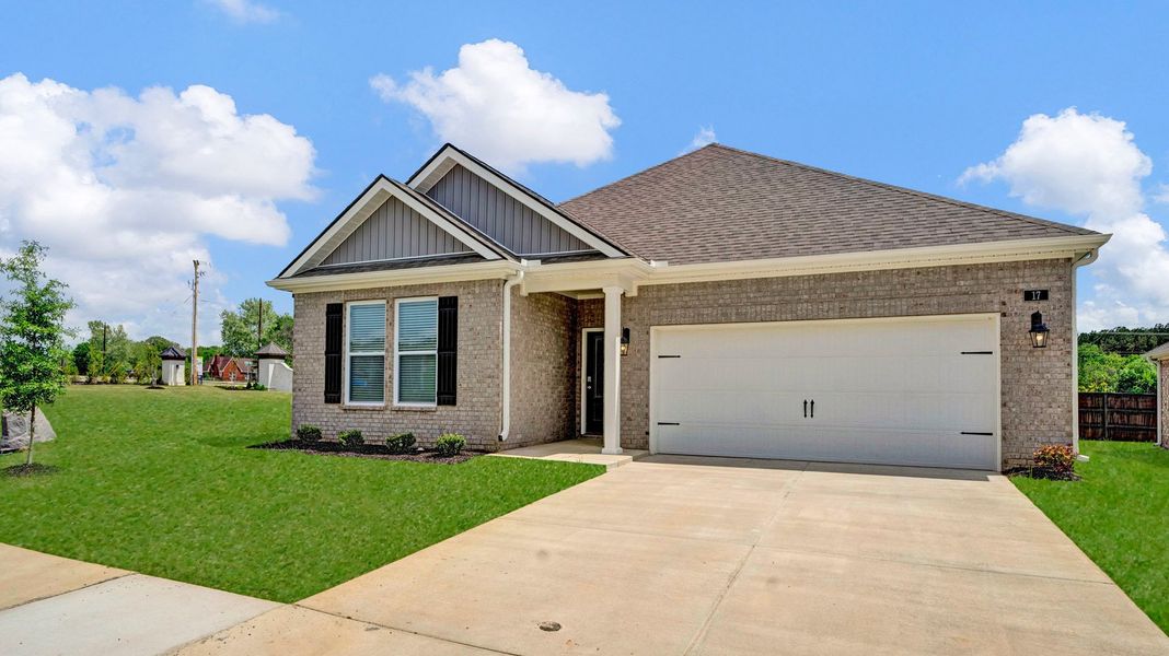 Front exterior of a new home in Riverwood Gardens, Oakland, TN, highlighting curb appeal (Image 2).