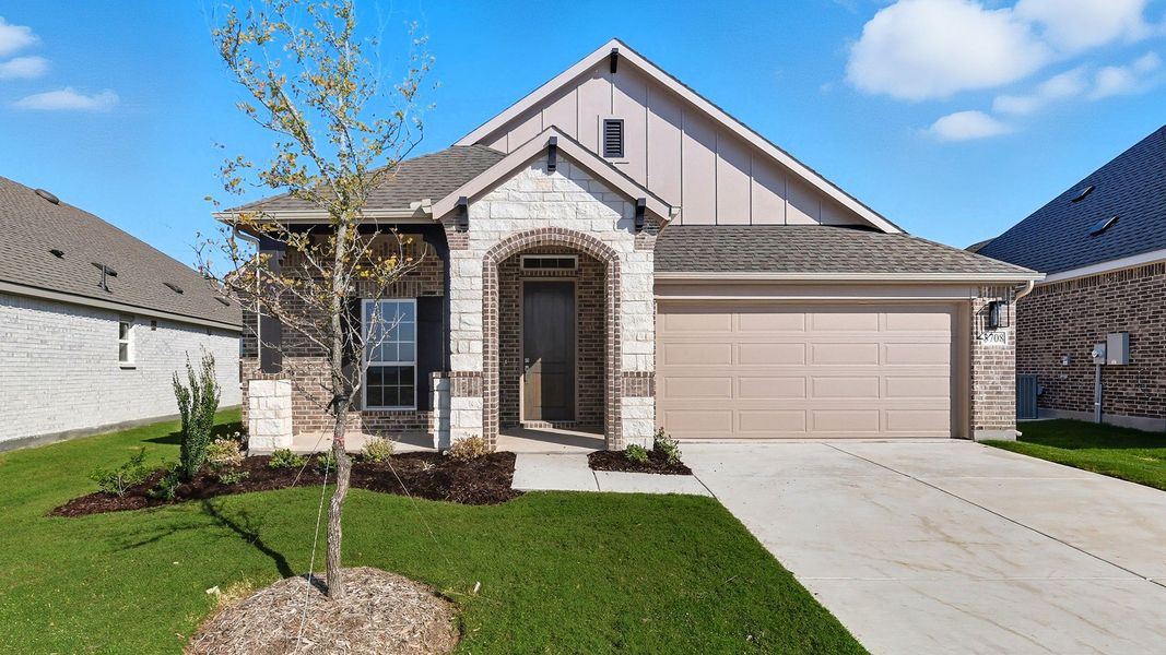 Front exterior of a new home in Churchill, Anna, TX, highlighting curb appeal (Image 2). Front exterior of a new home in Churchill, Anna, TX, highlighting curb appeal (Image 2).