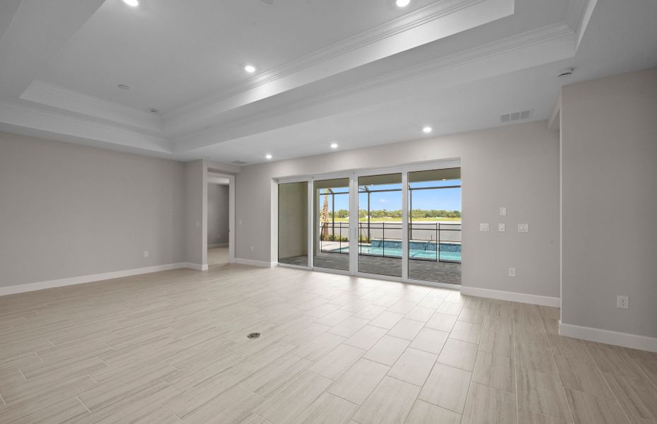 Spacious, unfurnished interior of a new home in Del Webb Oak Creek, North Fort Myers (Image 28).