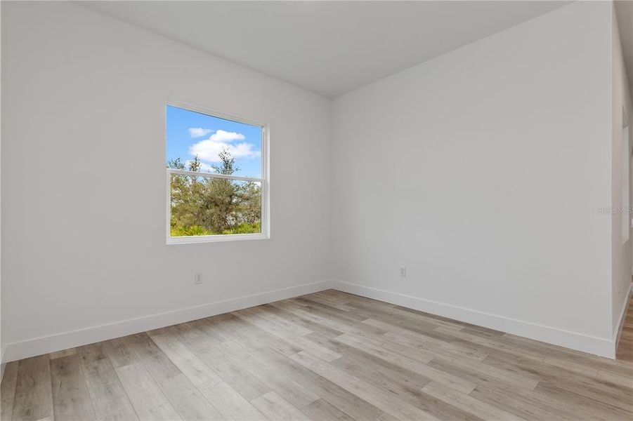 Spacious, unfurnished interior of a new home in , Port Charlotte (Image 29).