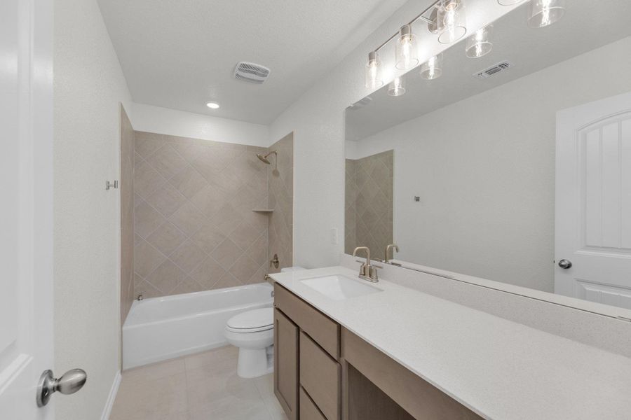 Furnished interior view inside a new home in Mustang Valley, Manor (Image 12).