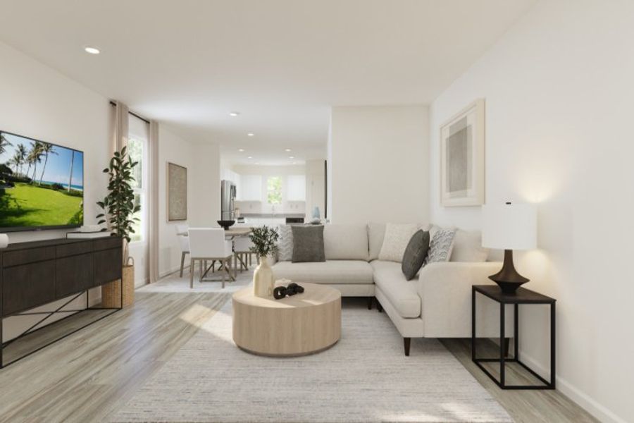 A living room with a large television. A living room with a large television.