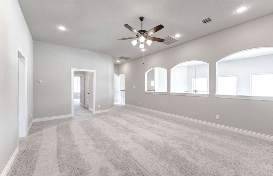 Representative unfurnished interior of a home built from the 3799 by Ravenna Homes in Artavia 70′, Conroe (Image 56).