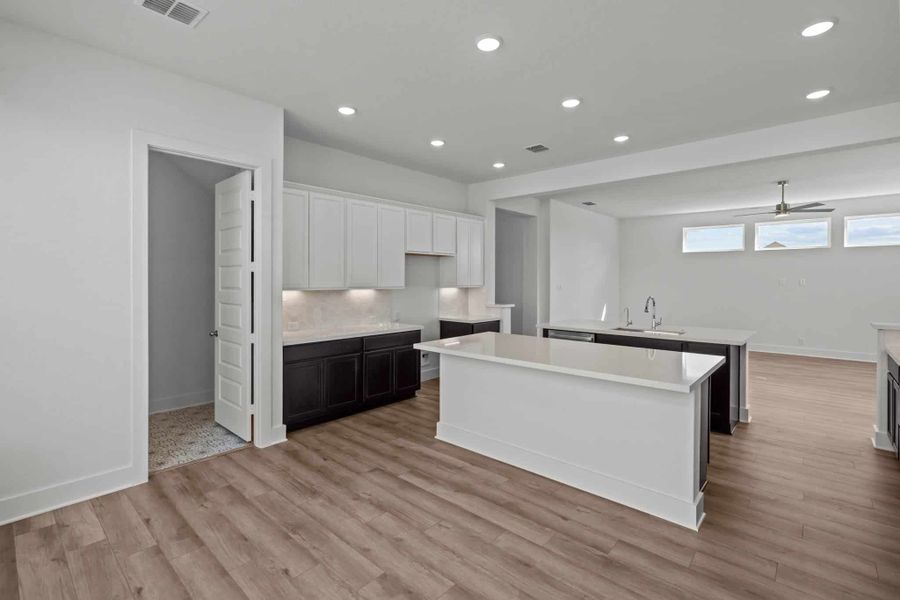 Furnished interior view inside a new home in Buffalo Crossing – New Phase Now Preselling, Cibolo (Image 11).