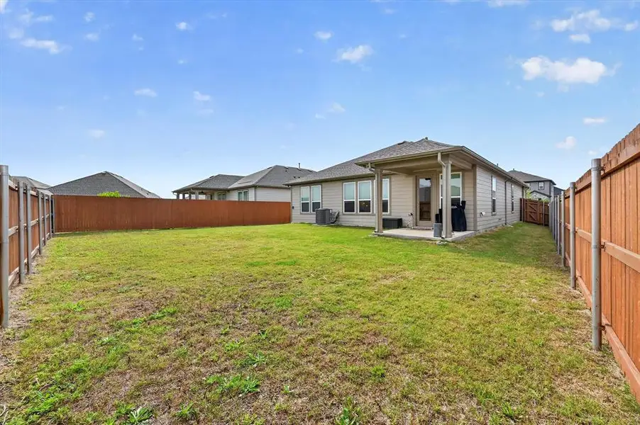 Exterior details and patio area of a home in , Crandall (Image 23).