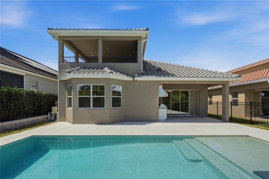 Exterior details and patio area of a home in Bella Collina, Montverde (Image 3).