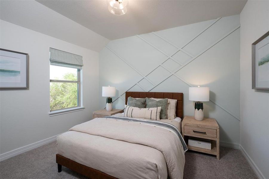 Your secondary bedroom features plush carpet, fresh paint, closet, and a large window that lets in plenty of natural lighting.