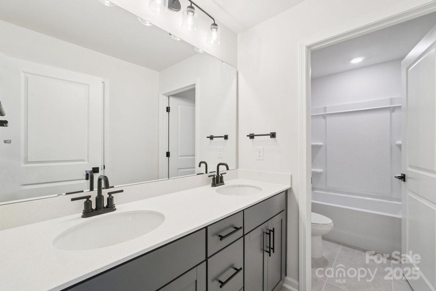 Furnished interior view inside a new home in Sylvan Creek, Denver (Image 7).