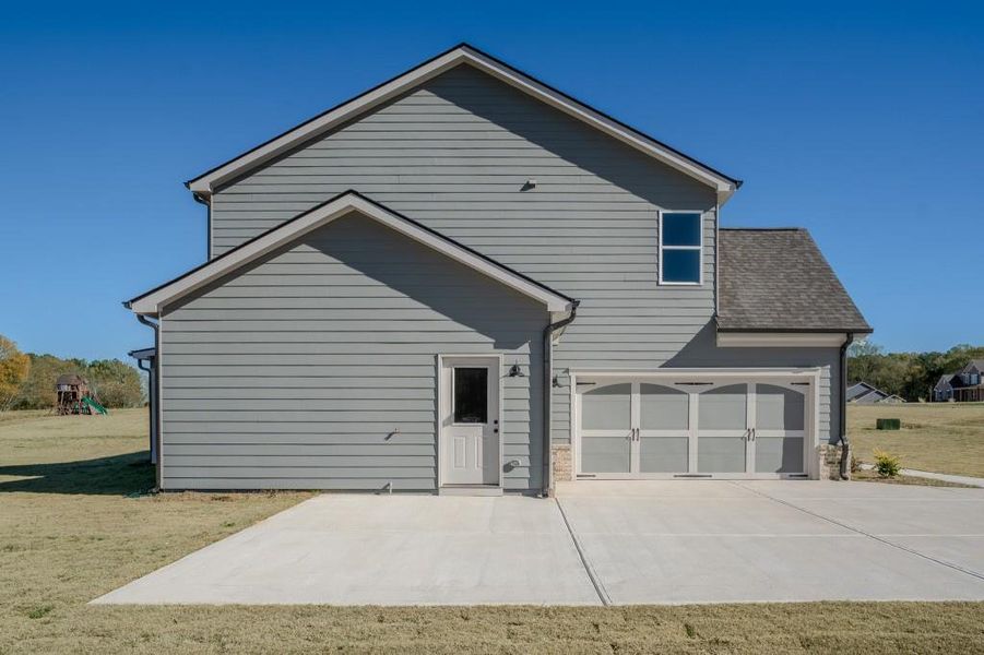 Front exterior of a new home in , Good Hope, GA, highlighting curb appeal (Image 19).