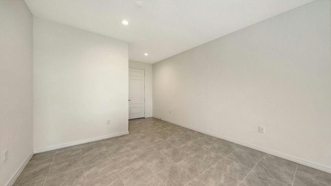 Spacious, unfurnished interior of a new home in Palm Grove Real Estate and Homes for Sale in Lakewood Ranch, FL - Neal Communities, Lakewood Ranch (Image 24).