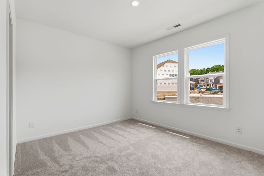 Spacious, unfurnished interior of a new home in River Falls, Tega Cay (Image 14).