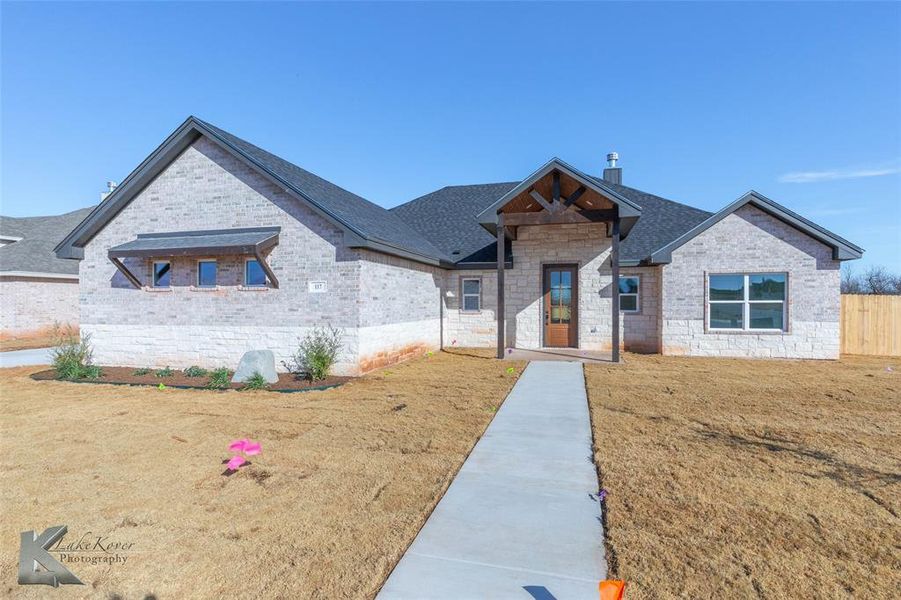 Front exterior of a new home in , Abilene, TX, highlighting curb appeal (Image 22).