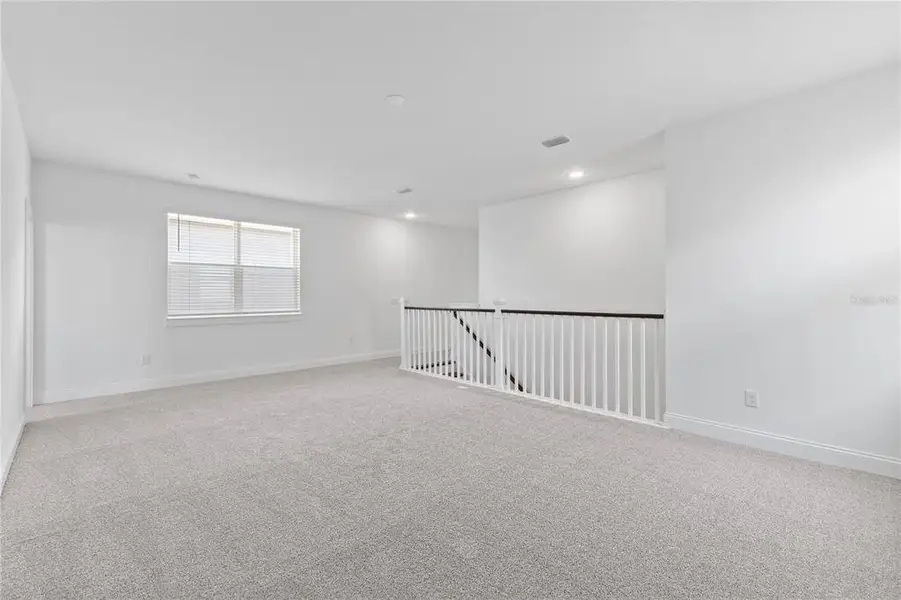 Spacious, unfurnished interior of a new home in Osprey Ranch, Winter Garden (Image 40).