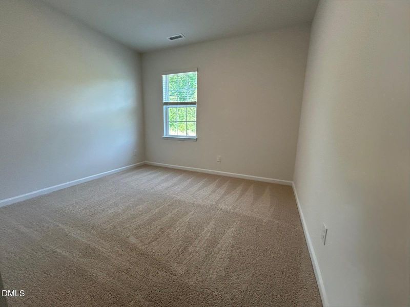 13. Bedroom 1 at main level with the vie