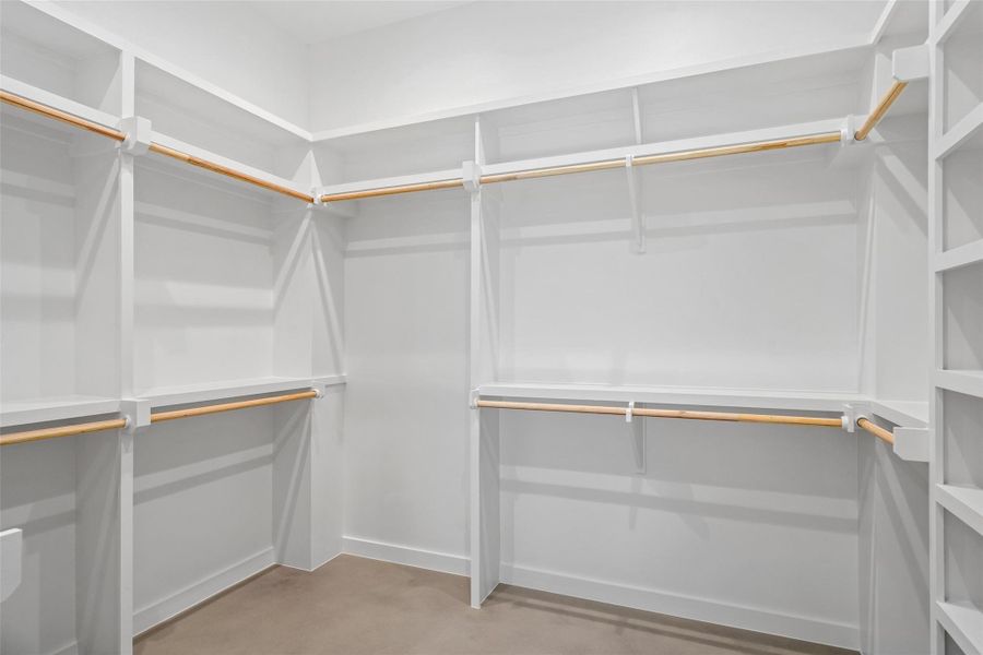 Primary closet in bathroom