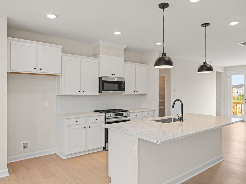 Furnished interior view inside a new home in Forestville Yard Townhomes, Knightdale (Image 6).