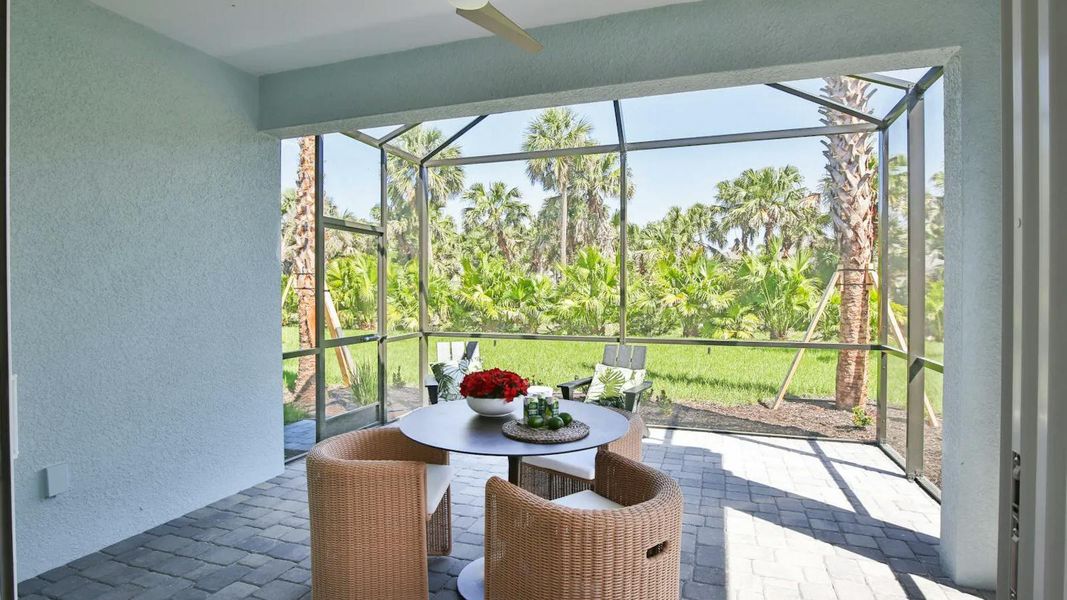 Exterior details and patio area of a home in Boca Royale Golf & Country Club Real Estate and Homes for Sale in Englewood, FL - Neal Communities, Englewood (Image 4). Exterior details and patio area of a home in Boca Royale Golf & Country Club Real Estate and Homes for Sale in Englewood, FL - Neal Communities, Englewood (Image 4).
