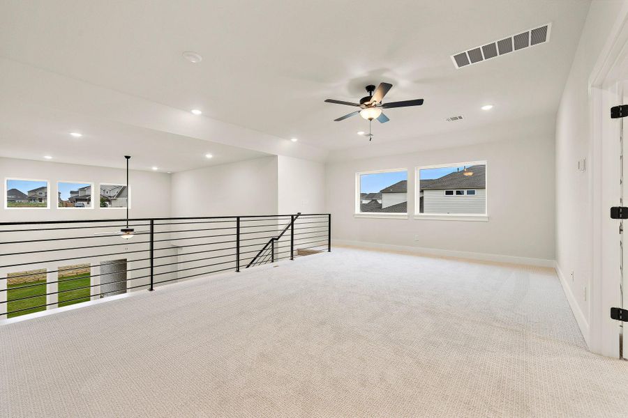 Spacious, unfurnished interior of a new home in Blackhawk in Pflugerville, Pflugerville (Image 17).