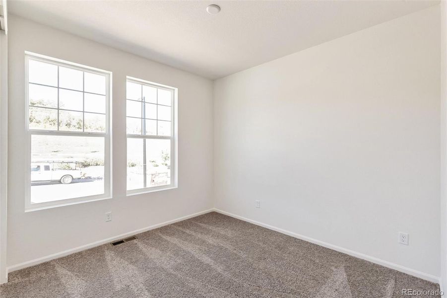 Spacious, unfurnished interior of a new home in Terrain Oak Valley, Castle Rock (Image 22).