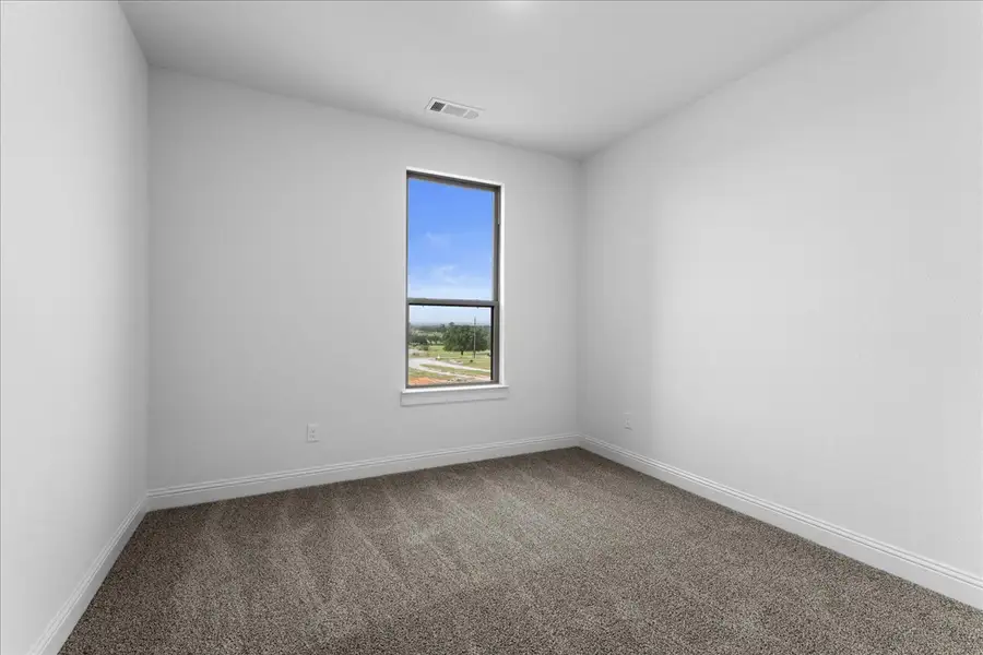 Representative unfurnished interior of a home built from the The Aylin by Doug Parr Custom Homes in Kessler Farms, Brock (Image 47).