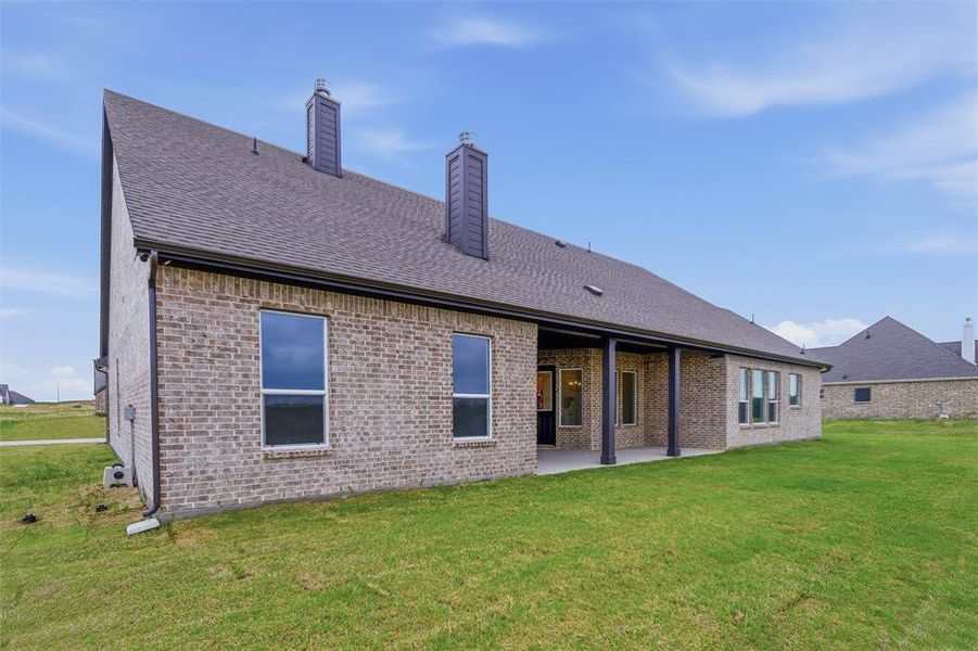 Exterior details and patio area of a home in Creekview Addition, Van Alstyne (Image 20).