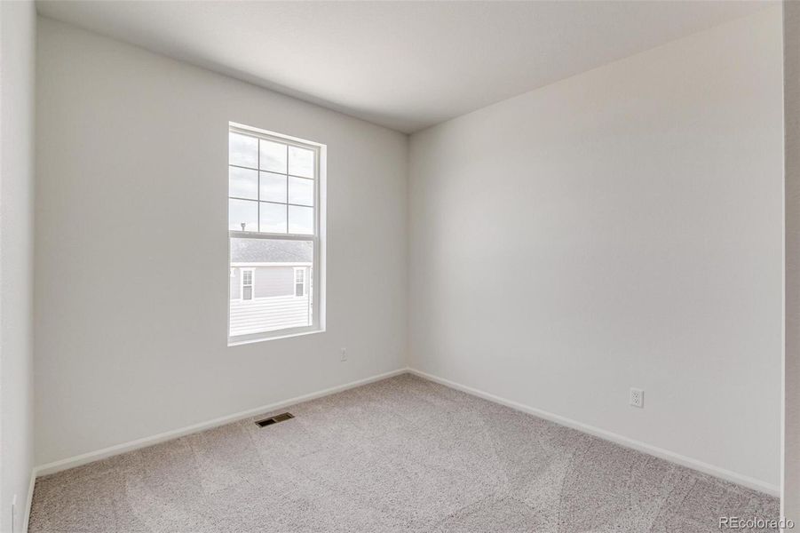 Spacious, unfurnished interior of a new home in Terrain Oak Valley, Castle Rock (Image 31).