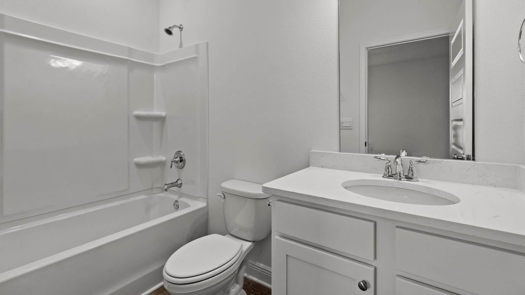 Representative furnished interior of a home built from the Camden by D.R. Horton in Owl's Head Farms, Freeport (Image 10).