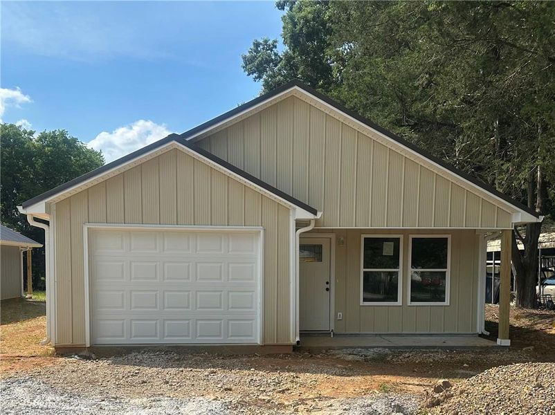 Front exterior of a new home in , White, GA, highlighting curb appeal (Image 2). Front exterior of a new home in , White, GA, highlighting curb appeal (Image 2).