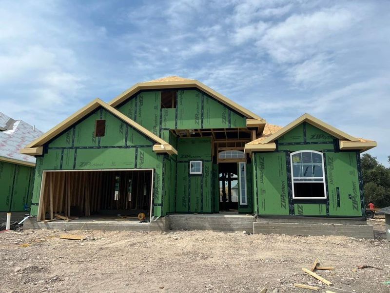 View of front of property featuring a garage View of front of property featuring a garage