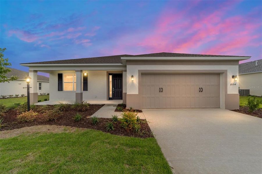 Front exterior of a new home in , Ocala, FL, highlighting curb appeal (Image 20). Front exterior of a new home in , Ocala, FL, highlighting curb appeal (Image 20).