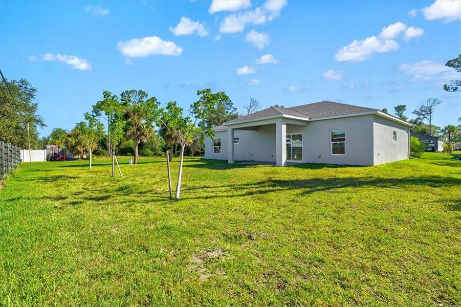 Exterior details and patio area of a home in , North Port (Image 24).