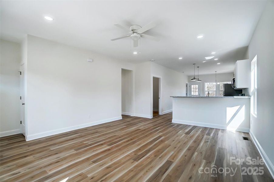 Open Floorplan of Living Room leading to the Kitchen