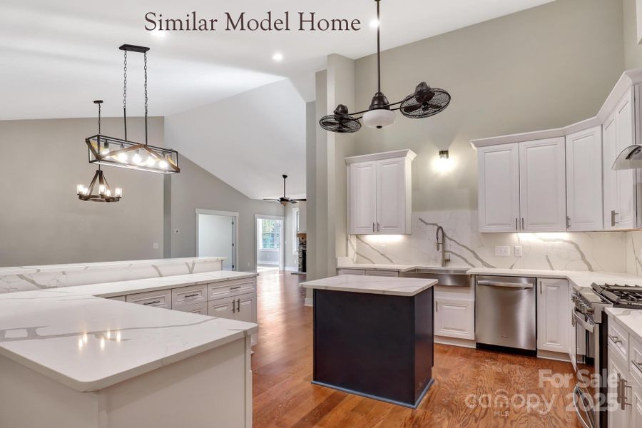 Spacious kitchen with direct dining access Spacious kitchen with direct dining access