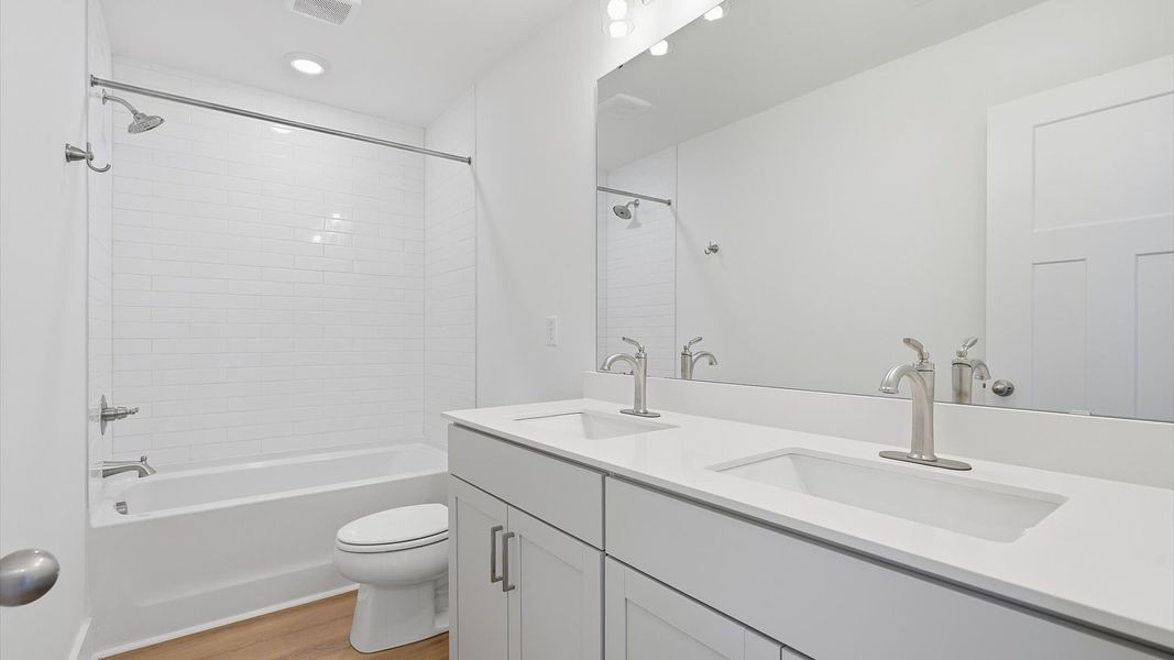 Top-notch bathroom with current fixtures, tasteful materials, and elevated charm located in Woodruff, SC