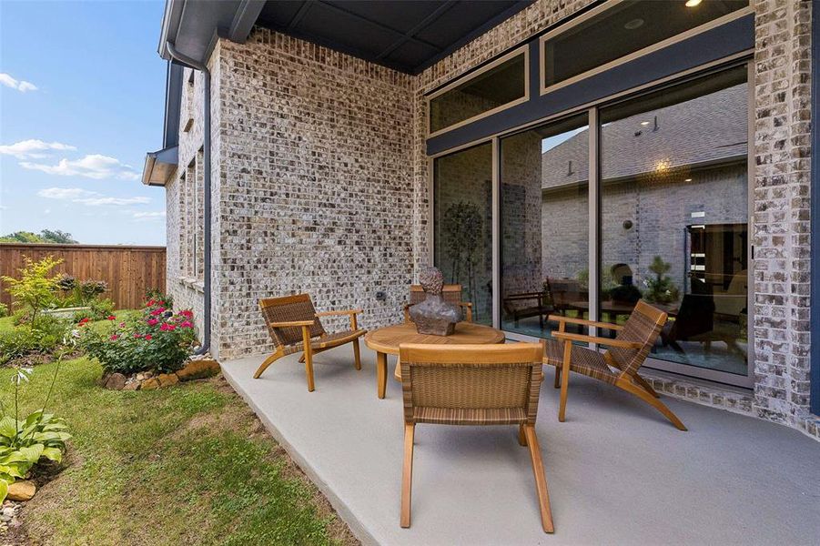 Exterior details and patio area of a home in Elements at Viridian - Garden Series, Arlington (Image 26).