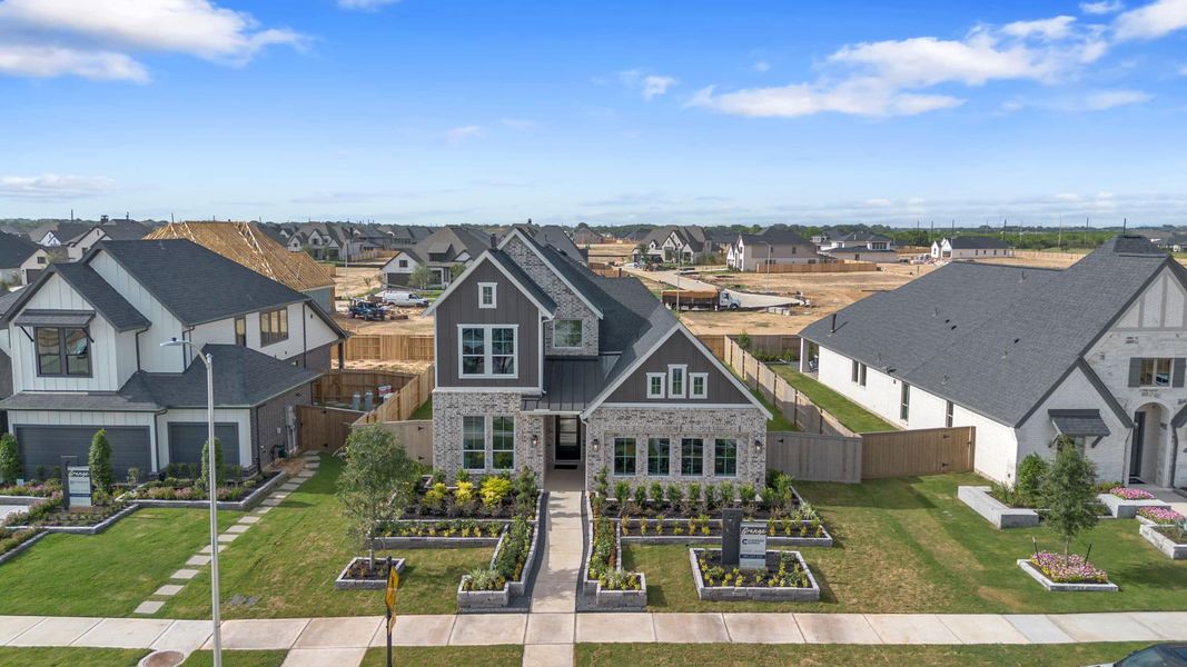 Representative exterior photo of a completed home built from the Cayman 50′ Lot by Chesmar Homes in Meridiana, Manvel, TX (Image 26). Representative exterior photo of a completed home built from the Cayman 50′ Lot by Chesmar Homes in Meridiana, Manvel, TX (Image 26).