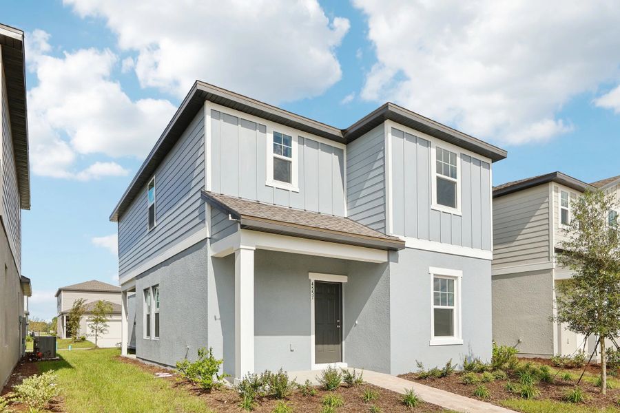 Representative exterior photo of a completed home built from the Lyon by Starlight Homes in Hawks Run, Kissimmee, FL (Image 25). Representative exterior photo of a completed home built from the Lyon by Starlight Homes in Hawks Run, Kissimmee, FL (Image 25).