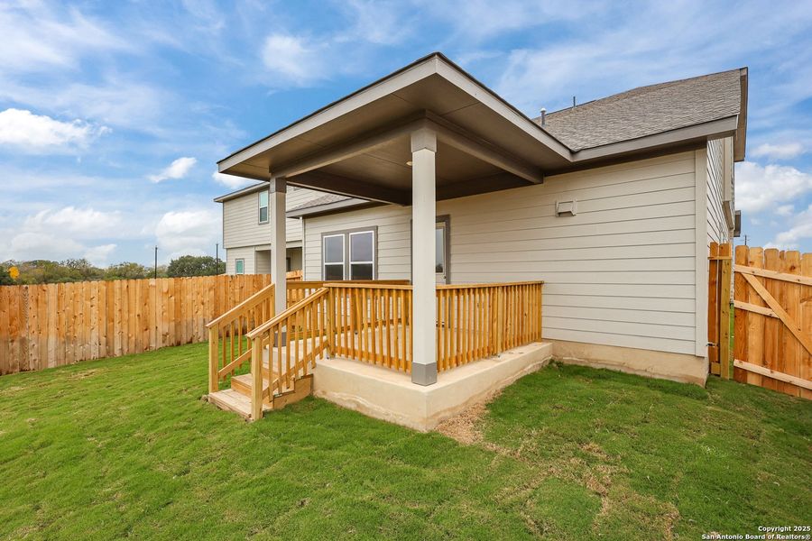 Exterior details and patio area of a home in Garden Grove, Schertz (Image 17).