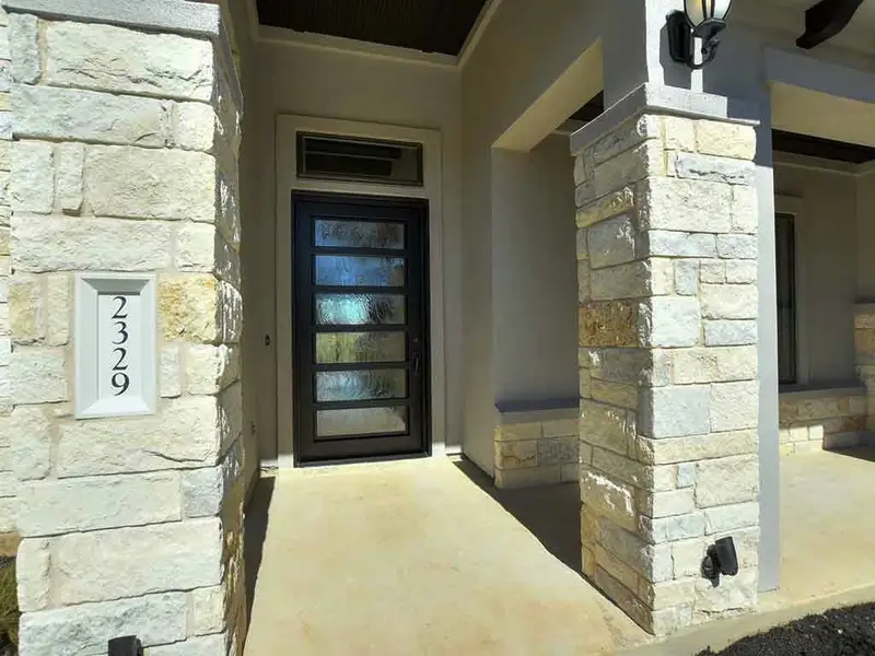Representative exterior details of a home built from the Santa Barbara II by Giddens Homes in Scofield Farms Estates, Georgetown (Image 42).