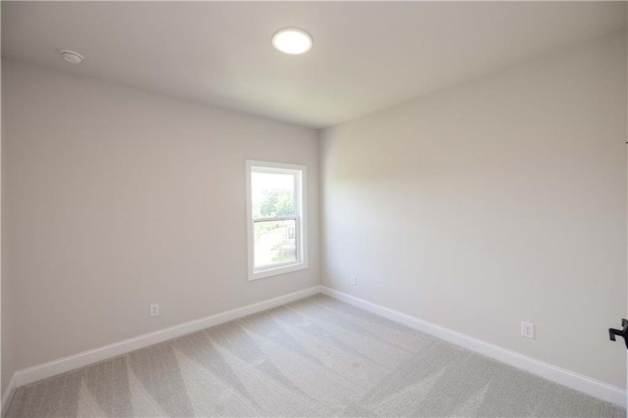 Spacious, unfurnished interior of a new home in Waterhaven, Cumming (Image 33).