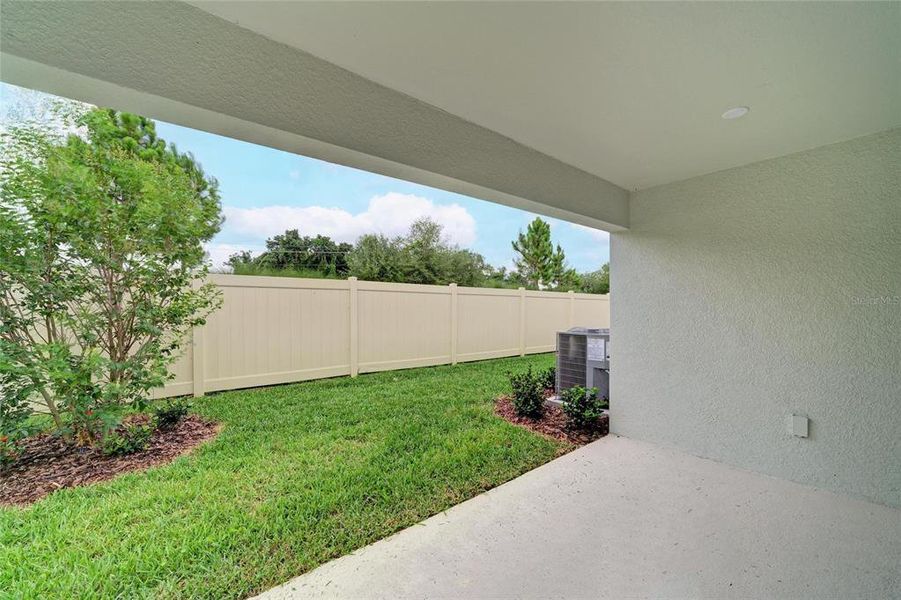 Exterior details and patio area of a home in Crosswind Point, Parrish (Image 2).