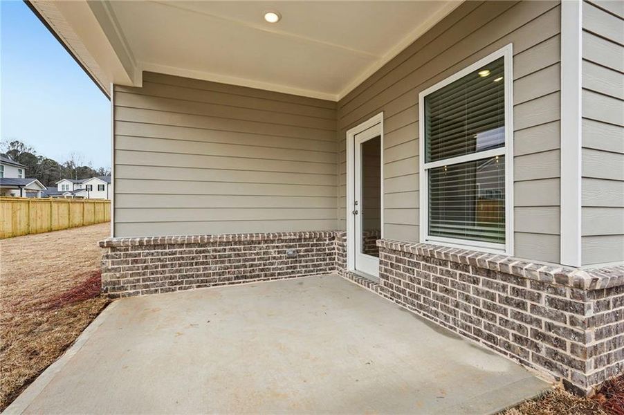 Exterior details and patio area of a home in Westmont Preserve, Powder Springs (Image 31). Exterior details and patio area of a home in Westmont Preserve, Powder Springs (Image 31).