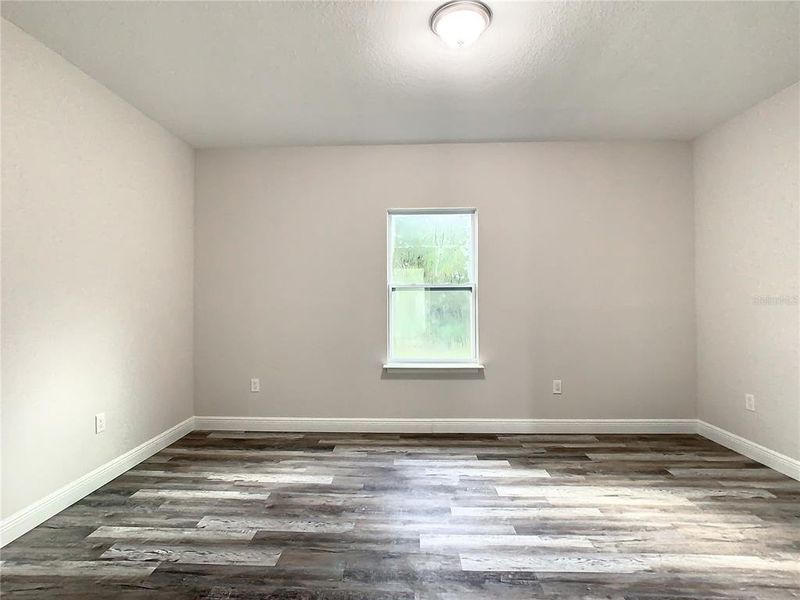 Spacious, unfurnished interior of a new home in , Port Charlotte (Image 18).