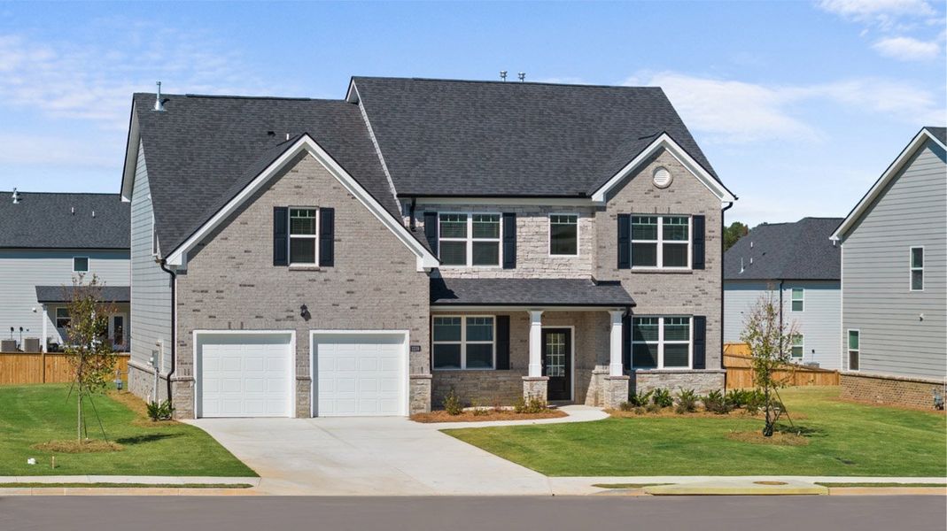 Front exterior of a new home in Independence, Loganville, GA, highlighting curb appeal (Image 1). Front exterior of a new home in Independence, Loganville, GA, highlighting curb appeal (Image 1).