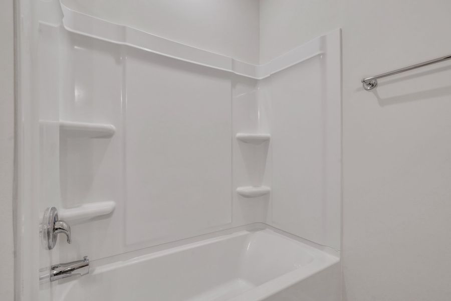 Representative furnished interior of a home built from the The Hatteras by Smith Family Homes in Ramsey Landing, Rincon (Image 13).